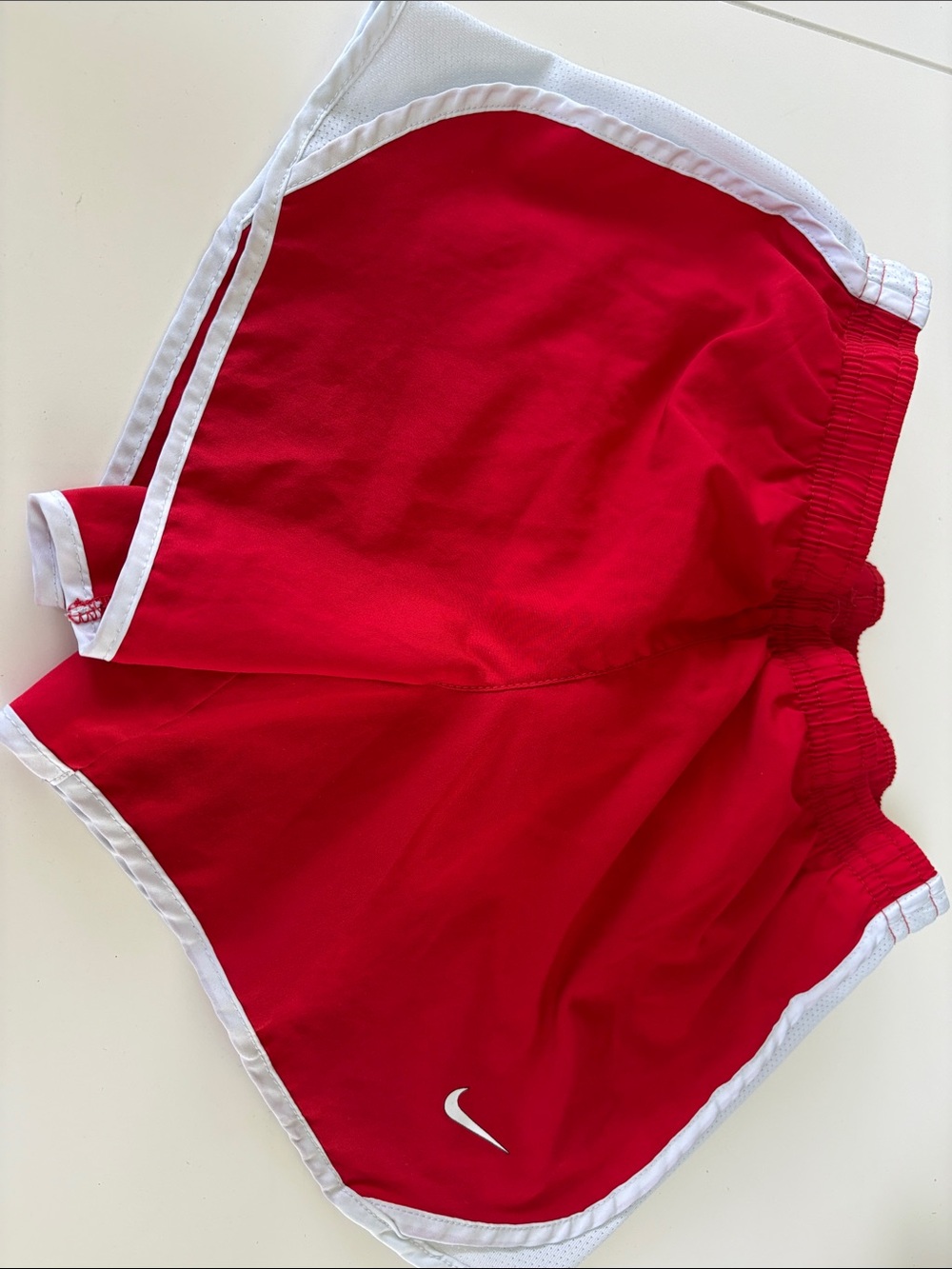 Nike Kids Red Athletic Shorts with White Trim. Used. Size M.